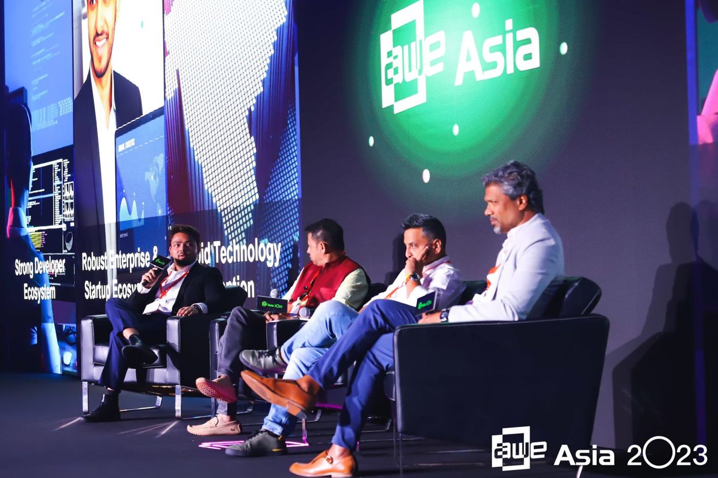 Panel discussion on the AWE Asia 2023 main stage featuring Sanan Goyal